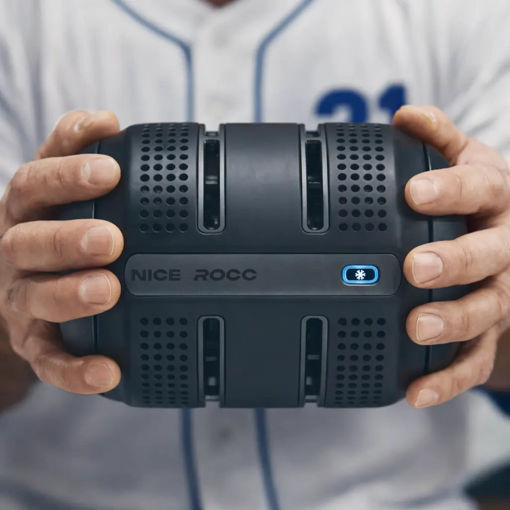 3. Place your uncovered palms on the domed ends of the ROCC to begin palm cooling. Hold the ROCC continuously for at least 90 seconds to receive performance benefits.